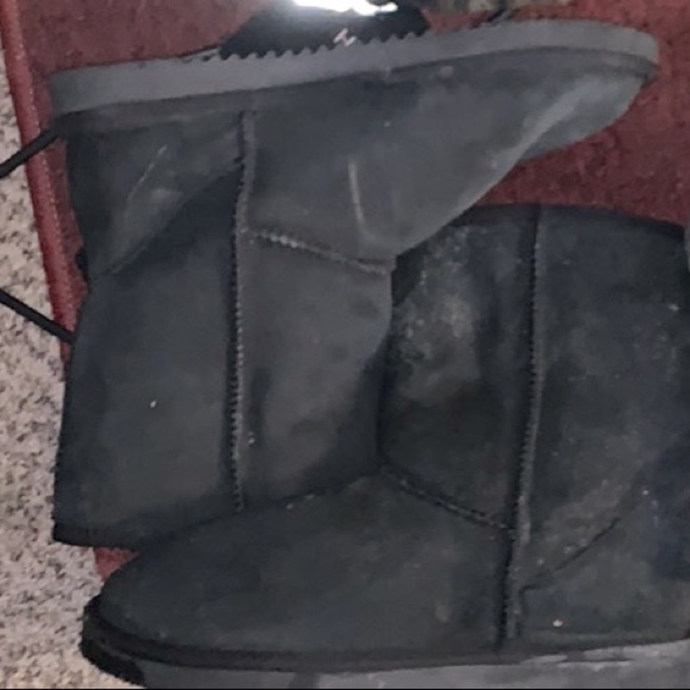 Black sheep fur boots.